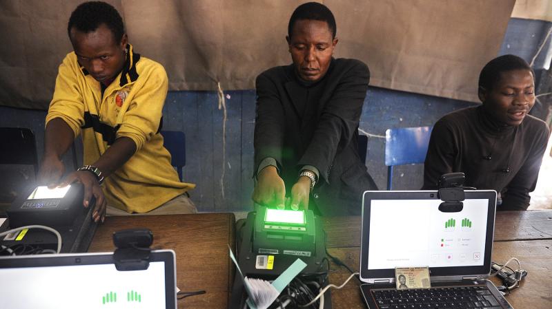 Kenyan authorities are trying to guard against fraud and violence when they hold a presidential election on March 4. Here, voters register on biometric equipment last December in Nairobi. Kenyan authorities are trying to guard against fraud and violence when they hold a presidential election on March 4. Here, voters register on biometric equipment last December in Nairobi.