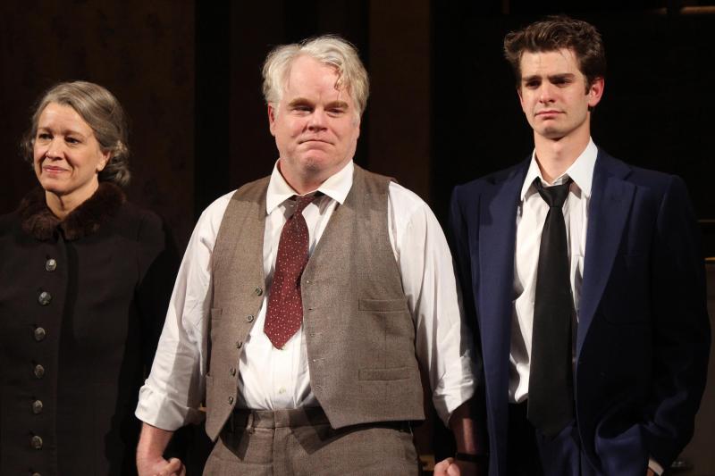 Linda Emond, Hoffman and Andrew Garfield take their opening night curtain call in Arthur Miller's Death of a Salesman at The Barrymore Theatre in New York City in 2012. Linda Emond, Hoffman and Andrew Garfield take their opening night curtain call in Arthur Miller's Death of a Salesman at The Barrymore Theatre in New York City in 2012.