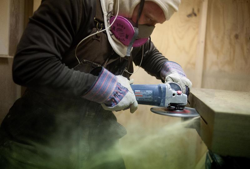 A worker makes a cut in the side of a sandstone block at the Cleveland Quarries facility in Vermilion, Ohio, earlier this month. The legal limit on the amount of silica that workers can inhale was set decades ago. A worker makes a cut in the side of a sandstone block at the Cleveland Quarries facility in Vermilion, Ohio, earlier this month. The legal limit on the amount of silica that workers can inhale was set decades ago.