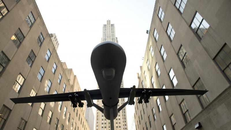 A model of a drone is hoisted in the air at a protest of the U.S. military's use of drones during a demonstration on April 3 in New York. A model of a drone is hoisted in the air at a protest of the U.S. military's use of drones during a demonstration on April 3 in New York.