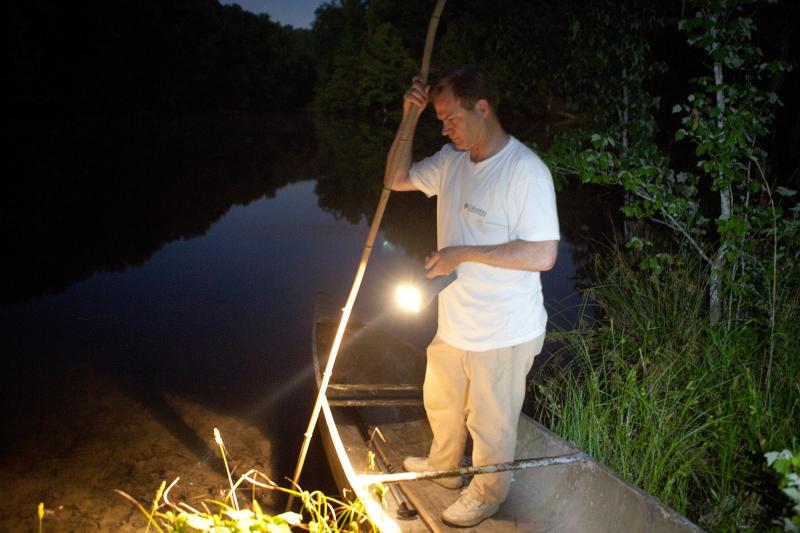 Tommy Peebles shines a light on the pond. With the help of Bick Boyte, the two Tennesseans catch frogs with homemade "gigs" for a frog leg fry they hold every year. Tommy Peebles shines a light on the pond. With the help of Bick Boyte, the two Tennesseans catch frogs with homemade "gigs" for a frog leg fry they hold every year.