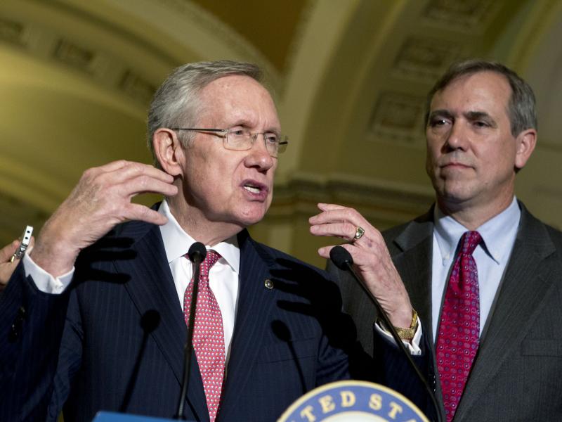 Senate Majority Leader Harry Reid (left) with Democratic Sen. Jeff Merkley on Capitol Hill in July. Both senators favor curtailing the minority's right to filibuster judicial nominees. Senate Majority Leader Harry Reid (left) with Democratic Sen. Jeff Merkley on Capitol Hill in July. Both senators favor curtailing the minority's right to filibuster judicial nominees.