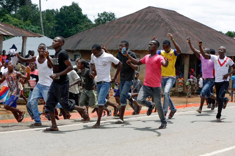 A celebration erupts in the streets of the Massessehbeh village on Friday, after President Ernest Bai Koroma officially ended Sierra Leone's largest remaining Ebola quarantine. A celebration erupts in the streets of the Massessehbeh village on Friday, after President Ernest Bai Koroma officially ended Sierra Leone's largest remaining Ebola quarantine.