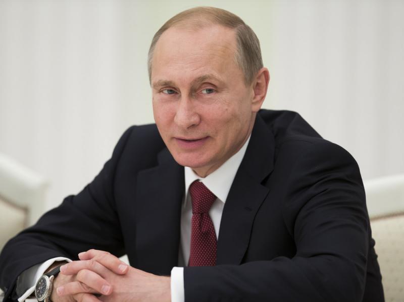 Russian President Vladimir Putin smiles during a meeting with foreign ministers of the Shanghai Cooperation Organization in Moscow last week. Russian President Vladimir Putin smiles during a meeting with foreign ministers of the Shanghai Cooperation Organization in Moscow last week.