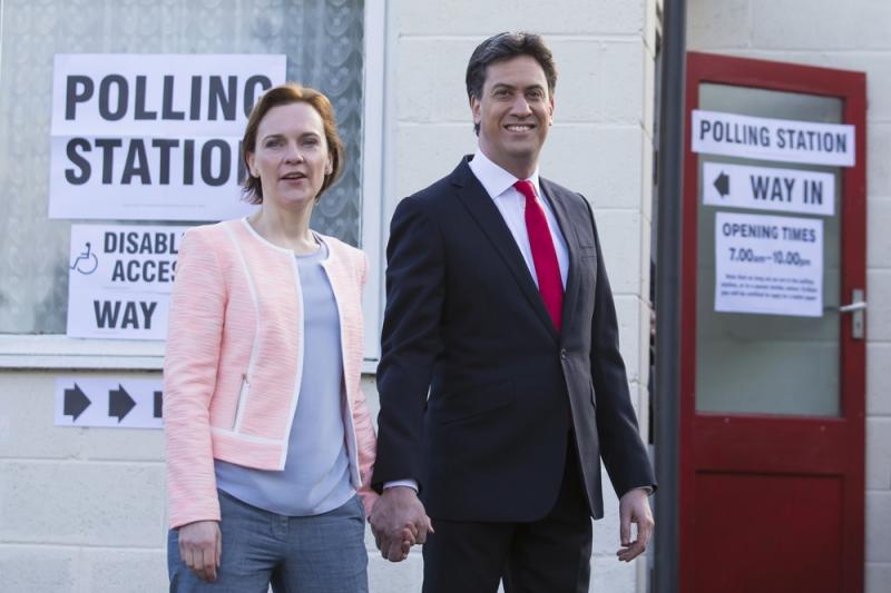 Labour Party leader Ed Miliband and his wife, Justine, leave the polling station after voting at Sutton Village Hall, Doncaster, England, on Thursday. Labour Party leader Ed Miliband and his wife, Justine, leave the polling station after voting at Sutton Village Hall, Doncaster, England, on Thursday.