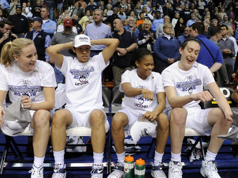Members of Connecticut's women's basketball team react after their 84-70 victory over USF in an NCAA college basketball game in the finals of the American Athletic Conference tournament. UConn is the returning champ in this year's women's bracket. Members of Connecticut's women's basketball team react after their 84-70 victory over USF in an NCAA college basketball game in the finals of the American Athletic Conference tournament. UConn is the returning champ in this year's women's bracket.