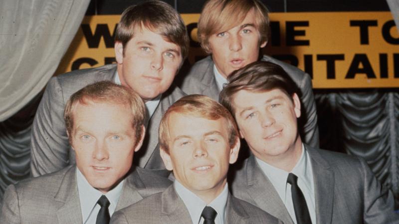 The Beach Boys in 1964. Top row: Carl Wilson, Dennis Wilson. Bottom row: Mike Love, Al Jardine, Brian Wilson. The Beach Boys in 1964. Top row: Carl Wilson, Dennis Wilson. Bottom row: Mike Love, Al Jardine, Brian Wilson.