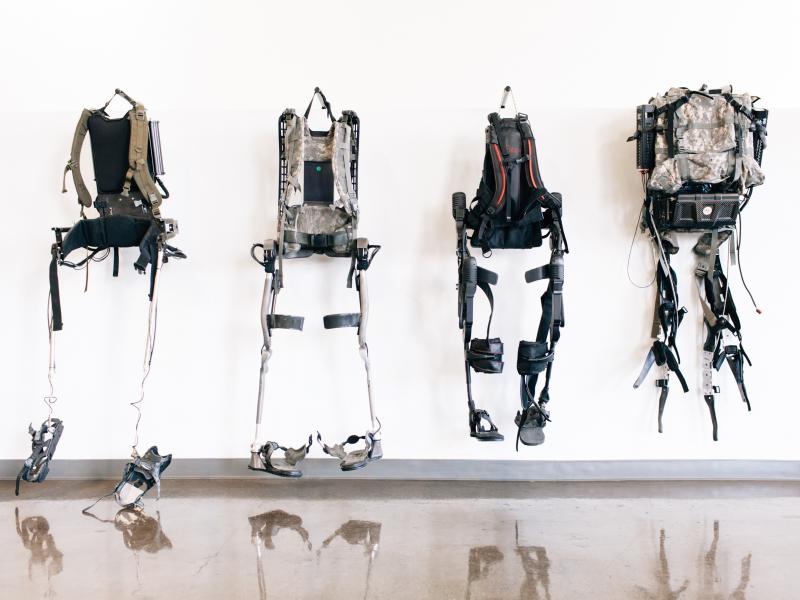 The evolution of exoskeletons, hanging on the wall at Ekso Bionics in Richmond, Calif. The evolution of exoskeletons, hanging on the wall at Ekso Bionics in Richmond, Calif.