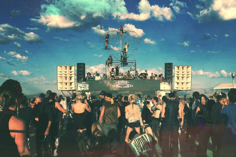 Revelers take in the Robot Heart art-car sound system at the 2014 Burning Man festival. Revelers take in the Robot Heart art-car sound system at the 2014 Burning Man festival.