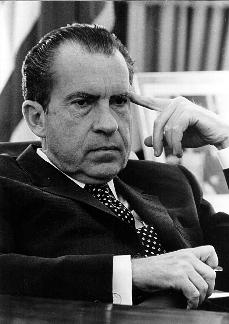 In his new book One Man Against the World, Tim Weiner explores some of the questions surrounding the presidency of Richard Nixon, pictured above in the Oval Office on Feb. 19, 1970. In his new book One Man Against the World, Tim Weiner explores some of the questions surrounding the presidency of Richard Nixon, pictured above in the Oval Office on Feb. 19, 1970.