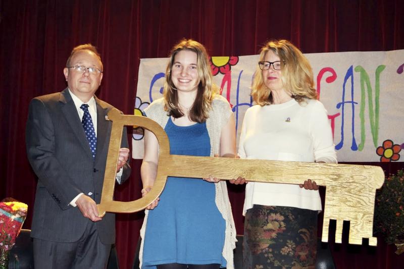 Teacher Sarah Hagan (center) receives the key to the city from Mark Whinnery, the city manager of Drumright, Okla., and Mayor Deborah Bright. Teacher Sarah Hagan (center) receives the key to the city from Mark Whinnery, the city manager of Drumright, Okla., and Mayor Deborah Bright.