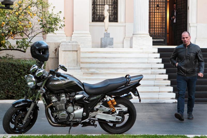 Greek Finance Minister Yanis Varoufakis walks toward his motorcycle following a meeting with Prime Minister Alexis Tsipras in Athens, Greece, on March 15. Varoufakis said Monday he was resigning, a day after Greeks voted to reject terms of a bailout impos Greek Finance Minister Yanis Varoufakis walks toward his motorcycle following a meeting with Prime Minister Alexis Tsipras in Athens, Greece, on March 15. Varoufakis said Monday he was resigning, a day after Greeks voted to reject terms of a bailout impos