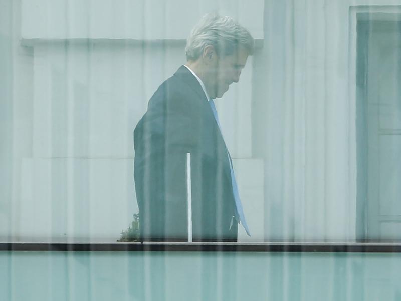 Secretary of State John Kerry walks on the terrace of Palais Coburg, the venue for nuclear talks in Vienna, on Sunday. Secretary of State John Kerry walks on the terrace of Palais Coburg, the venue for nuclear talks in Vienna, on Sunday.