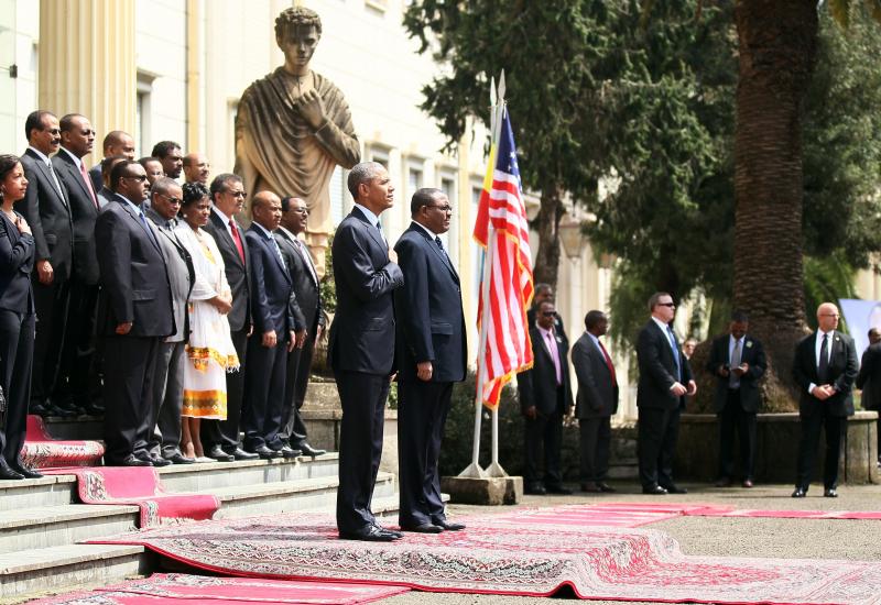 President Obama and his delegation stand Monday during a welcome ceremony with Ethiopia's Prime Minister Hailemariam Desalegn at the National Palace in Addis Ababa, Ethiopia. President Obama and his delegation stand Monday during a welcome ceremony with Ethiopia's Prime Minister Hailemariam Desalegn at the National Palace in Addis Ababa, Ethiopia.