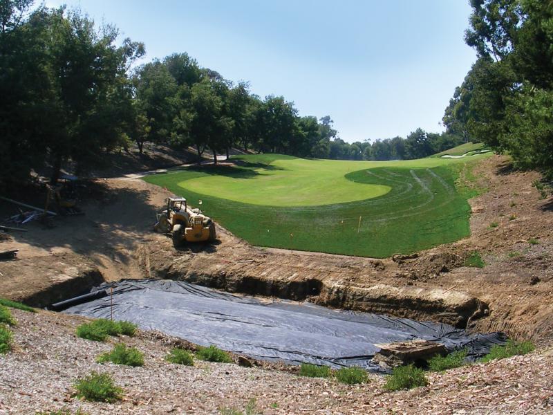 A bio-filtration basin, pictured during installation in 2007, captures water runoff from the Pelican Hill golf club's maintenance facility. The water is filtered through grass, gravel, sand, soil and filter fabric into an underground drainage system. A bio-filtration basin, pictured during installation in 2007, captures water runoff from the Pelican Hill golf club's maintenance facility. The water is filtered through grass, gravel, sand, soil and filter fabric into an underground drainage system.