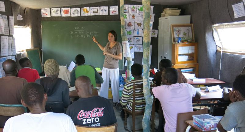 Migrants from Africa receive instruction in French in the port city of Calais. Some 3,000 migrants live in a makeshift camp known as "The Jungle." Most are seeking to travel on to Britain, while some are seeking asylum in France. Migrants from Africa receive instruction in French in the port city of Calais. Some 3,000 migrants live in a makeshift camp known as "The Jungle." Most are seeking to travel on to Britain, while some are seeking asylum in France.