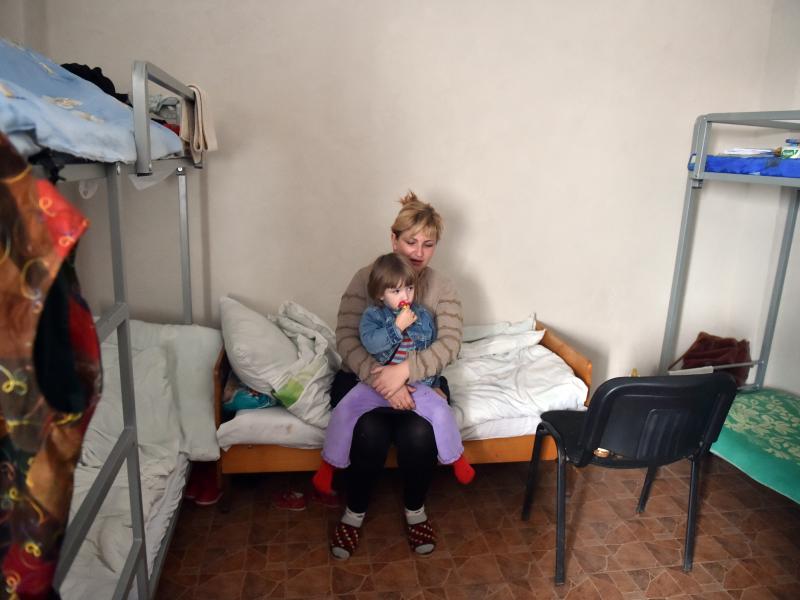 Refugees from different cities of the Donetsk region controlled by pro-Russia separatists stay March 12 in a center for refugees in the eastern Ukrainian city of Slavyansk. The cease-fire in eastern Ukraine between Kiev's forces and pro-Russian rebels has Refugees from different cities of the Donetsk region controlled by pro-Russia separatists stay March 12 in a center for refugees in the eastern Ukrainian city of Slavyansk. The cease-fire in eastern Ukraine between Kiev's forces and pro-Russian rebels has