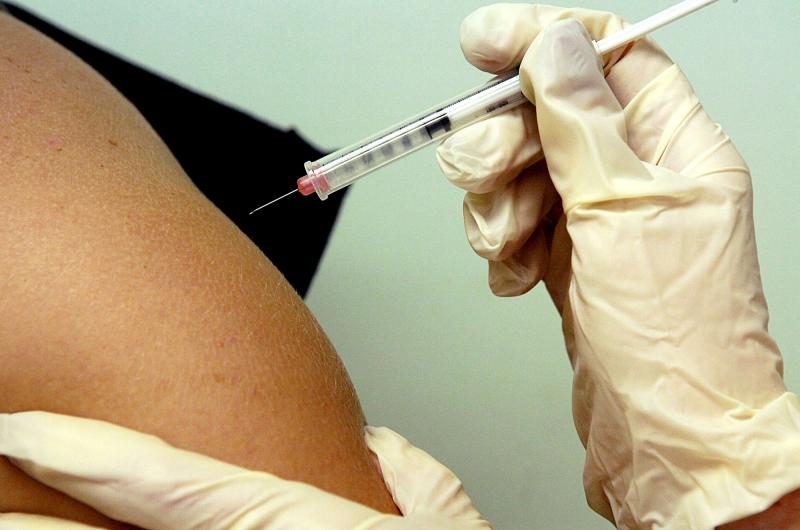 A teenage girl gets a shot of HPV vaccine, which protects against a virus that causes cervical cancer. A teenage girl gets a shot of HPV vaccine, which protects against a virus that causes cervical cancer.