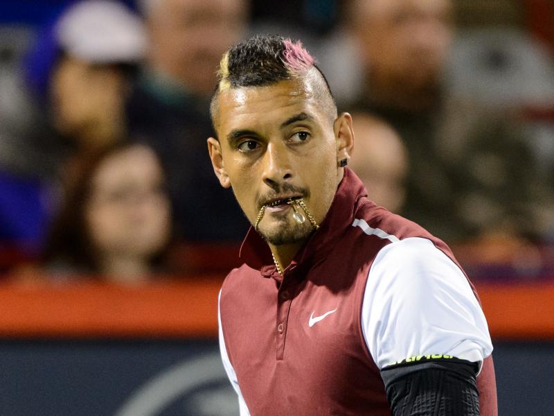 Tennis bad boy Nick Kyrgios bites his chain during his Rogers Cup match against Stan Wawrinka. Tennis bad boy Nick Kyrgios bites his chain during his Rogers Cup match against Stan Wawrinka.