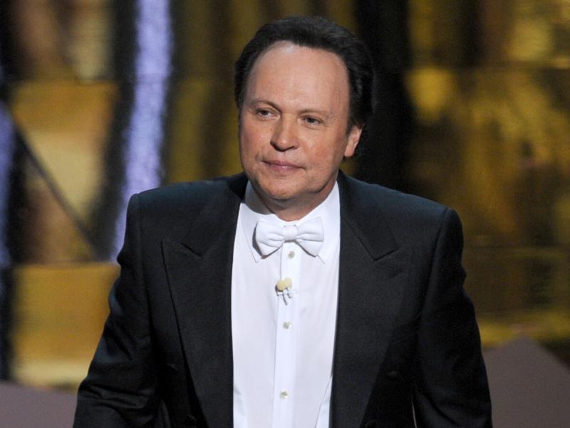 Billy Crystal hosts the 84th Annual Academy Awards in 2012. Writing jokes for hosts is a tricky game, says longtime joke writer Dave Boone. Billy Crystal hosts the 84th Annual Academy Awards in 2012. Writing jokes for hosts is a tricky game, says longtime joke writer Dave Boone.