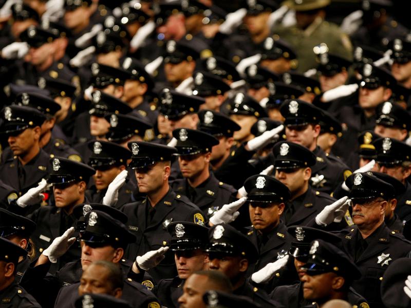 File photo of the Oakland Police Department as they salute at the public memorial service for slain Oakland police officers. File photo of the Oakland Police Department as they salute at the public memorial service for slain Oakland police officers.