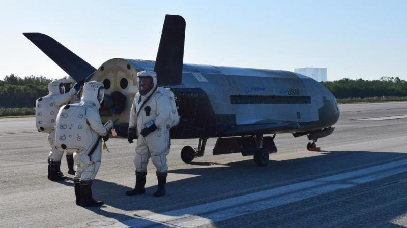 Secretive space plane lands after nearly two years in space