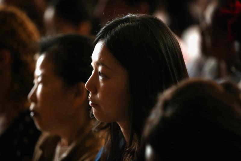 Jihye Jang of Korea participates in a naturalization ceremony at the Chicago Cultural Center on July 3, 2013, in Chicago. Jihye Jang of Korea participates in a naturalization ceremony at the Chicago Cultural Center on July 3, 2013, in Chicago.