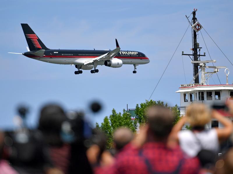 Donald Trump's plane arrives at a welcome event with Gov. Mike Pence at the Great Lakes Science Centre on Wednesday in Cleveland