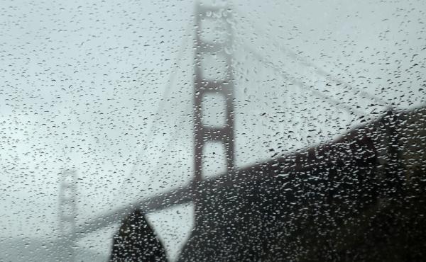 California's Golden Gate Bridge during a rainstorm. Scientists believe the moon's position has an impact on the amount of rainfall. California's Golden Gate Bridge during a rainstorm. Scientists believe the moon's position has an impact on the amount of rainfall.