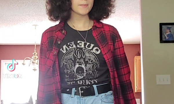 The story subject with big poofy hair