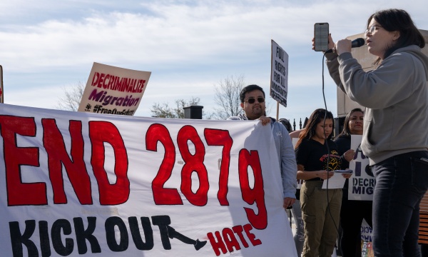 A coalition of immigrant advocacy groups hold a rally outside of the Georgia State Capitol in protest of HB 1105, a bill which would require local law enforcement to take on responsibilities of immigration and customs enforcements agents as part of a federal program known as 287g.