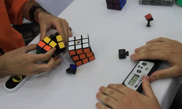 A contestant is seen before the start of the World Rubik's Cube Championship 2011 in Bangkok.