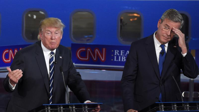 Republican presidential candidates Donald Trump, left speaks at a Republican presidential debate last month, as former Florida Gov. Jeb Bush listens. Republican presidential candidates Donald Trump, left speaks at a Republican presidential debate last month, as former Florida Gov. Jeb Bush listens.