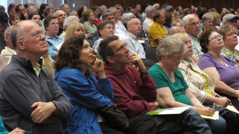 The audience concentrates on a presentation by Kansas Insurance Commissioner Sandy Praeger's office about the federal health care overhaul at the University of Kansas satellite campus in Overland Park, Kan., earlier this month. The audience concentrates on a presentation by Kansas Insurance Commissioner Sandy Praeger's office about the federal health care overhaul at the University of Kansas satellite campus in Overland Park, Kan., earlier this month.