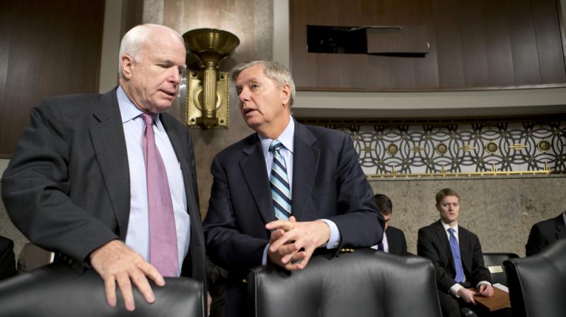 Sens. John McCain, R-Ariz., and Lindsey Graham, R-S.C., confer at the start of a Senate Armed Services Committee hearing last week on the appointments of military leaders. McCain and Graham have been among the Republicans pushing the Obama administration Sens. John McCain, R-Ariz., and Lindsey Graham, R-S.C., confer at the start of a Senate Armed Services Committee hearing last week on the appointments of military leaders. McCain and Graham have been among the Republicans pushing the Obama administration