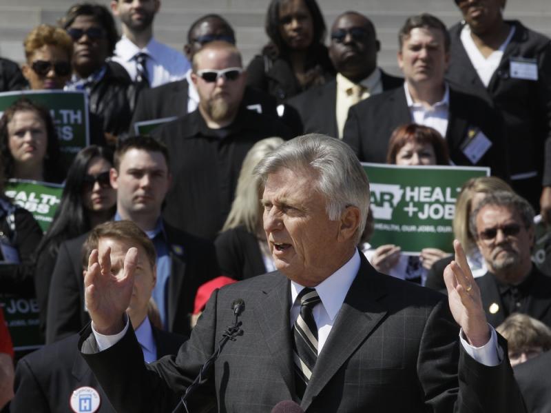 Arkansas Gov. Mike Beebe speaks at a rally promoting the expansion of Medicaid in the state in front of the Capitol in Little Rock on March 7. Arkansas Gov. Mike Beebe speaks at a rally promoting the expansion of Medicaid in the state in front of the Capitol in Little Rock on March 7.