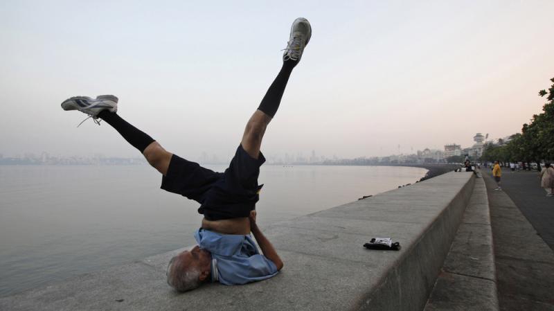An older man performs exercises in Mumbai, India. Research suggests that moderate physical exercise may be the best way to keep our brains healthy as we age. An older man performs exercises in Mumbai, India. Research suggests that moderate physical exercise may be the best way to keep our brains healthy as we age.