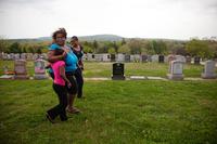 Michelle Williams (center) and two daughters visit the grave of her mother, Judy Williams, at Fairview Cemetery in Hyde Park, Mass., on May 11. Judy died in 2011. Michelle Williams (center) and two daughters visit the grave of her mother, Judy Williams, at Fairview Cemetery in Hyde Park, Mass., on May 11. Judy died in 2011.