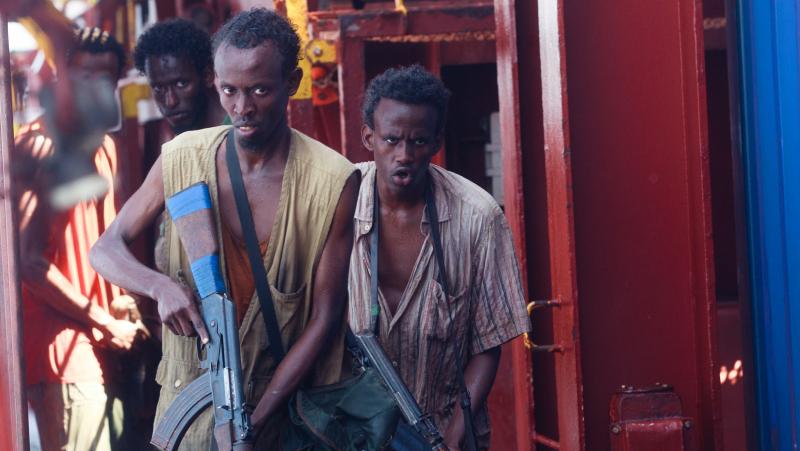 Barkhad Abdi (middle) plays Muse, the leader of a band of Somali pirates who take over a freighter in Captain Phillips. Barkhad Abdi (middle) plays Muse, the leader of a band of Somali pirates who take over a freighter in Captain Phillips.