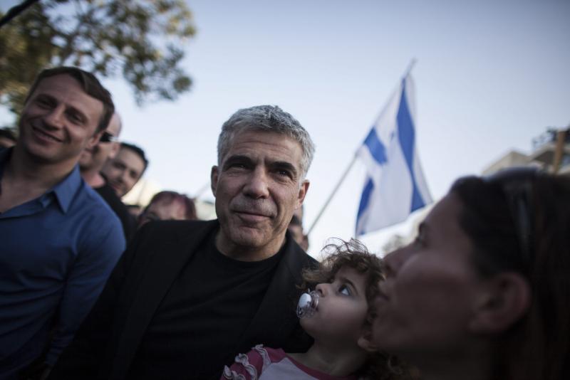 Yair Lapid and his new political party, There Is a Future, got the second-most votes in Israel's election on Tuesday. Yair Lapid and his new political party, There Is a Future, got the second-most votes in Israel's election on Tuesday.