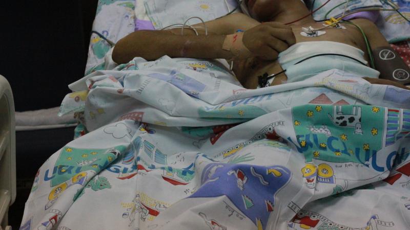 A wounded Syrian, suffering skull, stomach and pancreas injuries from an explosion, in intensive care at Ziv Medical Center in Israel. Hospital staff asked that faces and names not be included to protect the safety of the Syrian patients who could get in A wounded Syrian, suffering skull, stomach and pancreas injuries from an explosion, in intensive care at Ziv Medical Center in Israel. Hospital staff asked that faces and names not be included to protect the safety of the Syrian patients who could get in