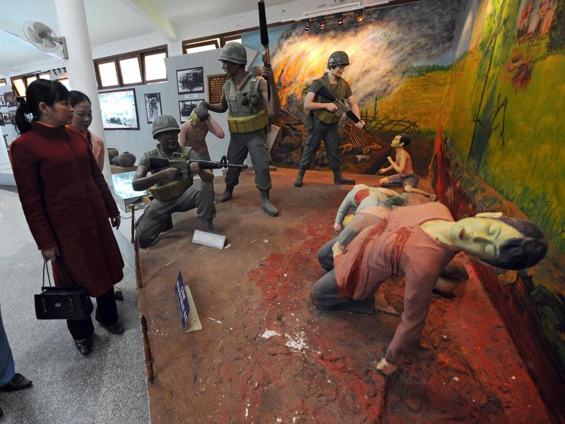 Visitors take in a re-created scene at the massacre museum at Vietnam's My Lai village. Researcher Nick Turse says atrocities of all kinds were more common in the Vietnam War than most Americans believe. Visitors take in a re-created scene at the massacre museum at Vietnam's My Lai village. Researcher Nick Turse says atrocities of all kinds were more common in the Vietnam War than most Americans believe.