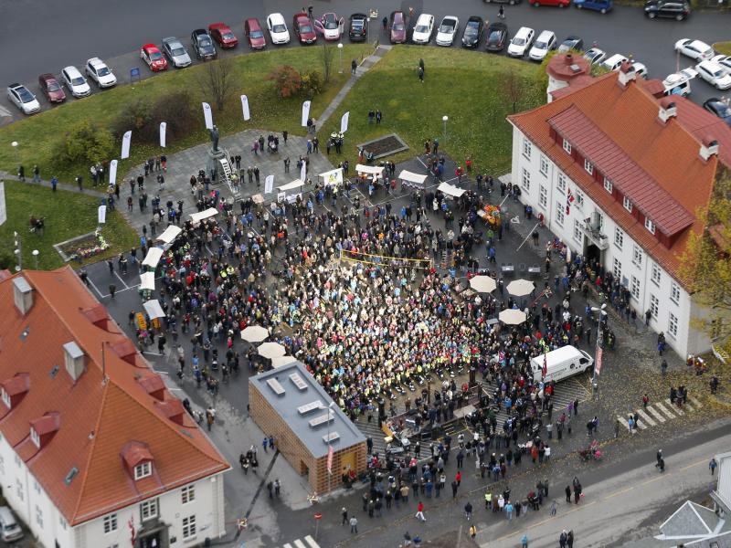 People gather in the central square of Rjukan, Norway, on Wednesday to bask in the sun reflected by mirrors on a nearby mountainside. People gather in the central square of Rjukan, Norway, on Wednesday to bask in the sun reflected by mirrors on a nearby mountainside.