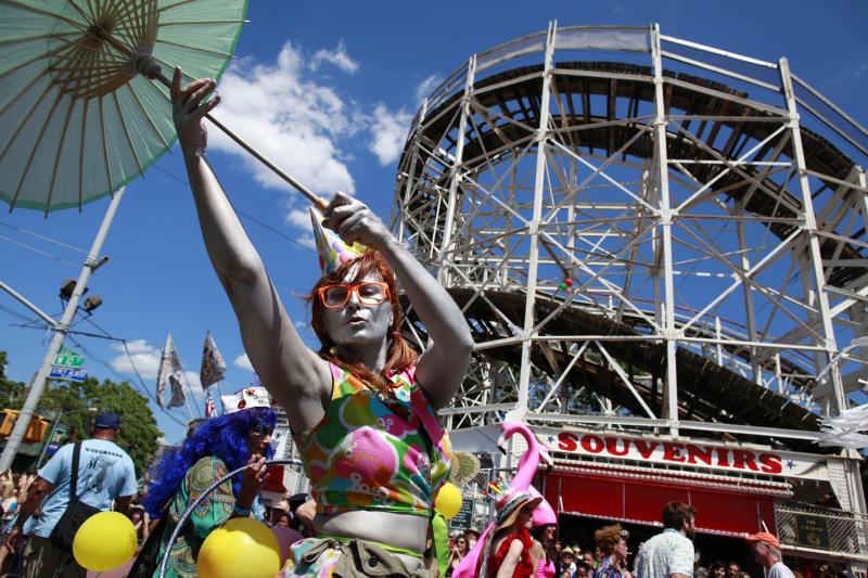 The Mermaid Parade at Coney Island draws hundreds of thousands of revelers each June. After sustaining significant damage during Superstorm Sandy, the nonprofit that runs the parade was almost unable to host this year's event, scheduled for Saturday. The Mermaid Parade at Coney Island draws hundreds of thousands of revelers each June. After sustaining significant damage during Superstorm Sandy, the nonprofit that runs the parade was almost unable to host this year's event, scheduled for Saturday.