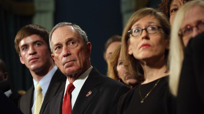 At a news conference last month, New York City Mayor Michael Bloomberg stands with people who have been affected by gun violence. At a news conference last month, New York City Mayor Michael Bloomberg stands with people who have been affected by gun violence.