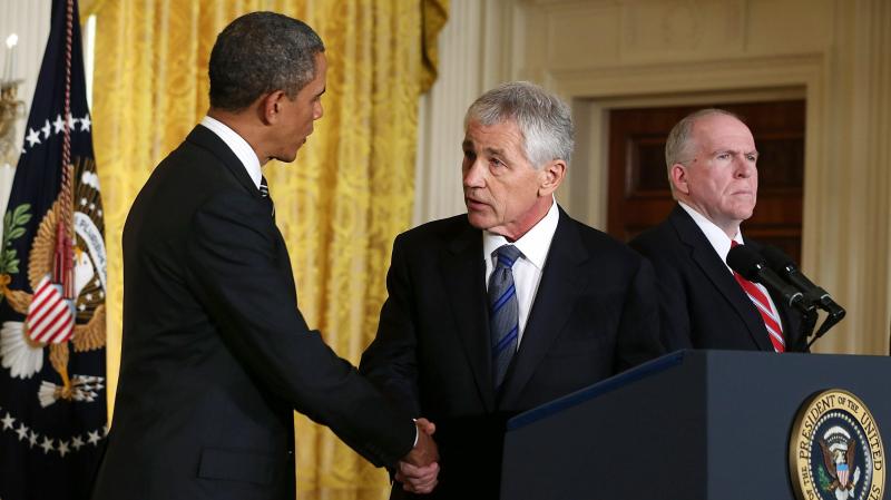 President Obama shakes hands with his nominee to head the Defense Department, former Sen. Chuck Hagel, at the White House on Jan. 7. John Brennan, Obama's choice for director of the CIA, looks on. President Obama shakes hands with his nominee to head the Defense Department, former Sen. Chuck Hagel, at the White House on Jan. 7. John Brennan, Obama's choice for director of the CIA, looks on.