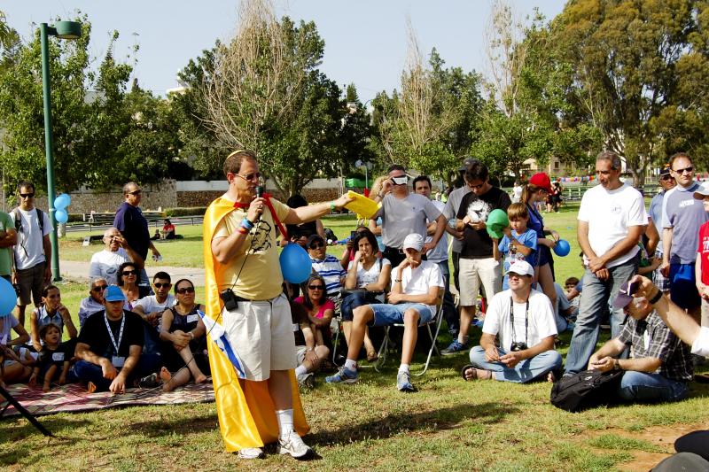 American-Israeli solar entrepreneur Yosef Abramowitz, aka Captain Sunshine, speaks during a rally of electric car owners in Israel. American-Israeli solar entrepreneur Yosef Abramowitz, aka Captain Sunshine, speaks during a rally of electric car owners in Israel.