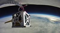 Three PhoneSats, like the one seen here during a high-altitude balloon test, were launched into space on Sunday. The slightly modified cellphone satellites cost a few thousand dollars in parts. Three PhoneSats, like the one seen here during a high-altitude balloon test, were launched into space on Sunday. The slightly modified cellphone satellites cost a few thousand dollars in parts.