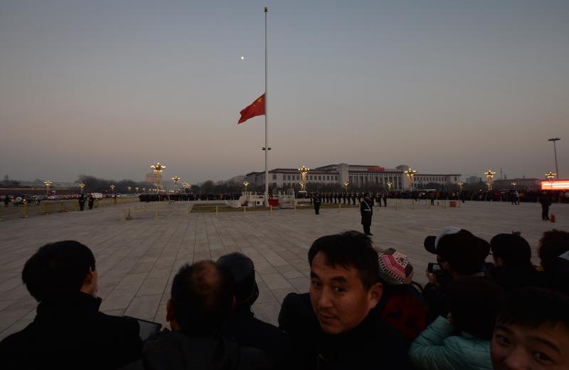 The Chinese flag is seen in front of a view of the moon at Beijing's Tiananmen Square in December, when China's first moon rover touched the lunar surface. That feat was widely celebrated — but observers believe the rover has now run into serious troubl The Chinese flag is seen in front of a view of the moon at Beijing's Tiananmen Square in December, when China's first moon rover touched the lunar surface. That feat was widely celebrated — but observers believe the rover has now run into serious troubl