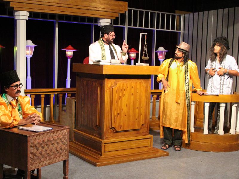 Zang-e-Khatar, or Danger Bell, makes fun of government officials and other powerful figures in Afghanistan. Cast members are shown performing a skit during a taping of the show. Zang-e-Khatar, or Danger Bell, makes fun of government officials and other powerful figures in Afghanistan. Cast members are shown performing a skit during a taping of the show.